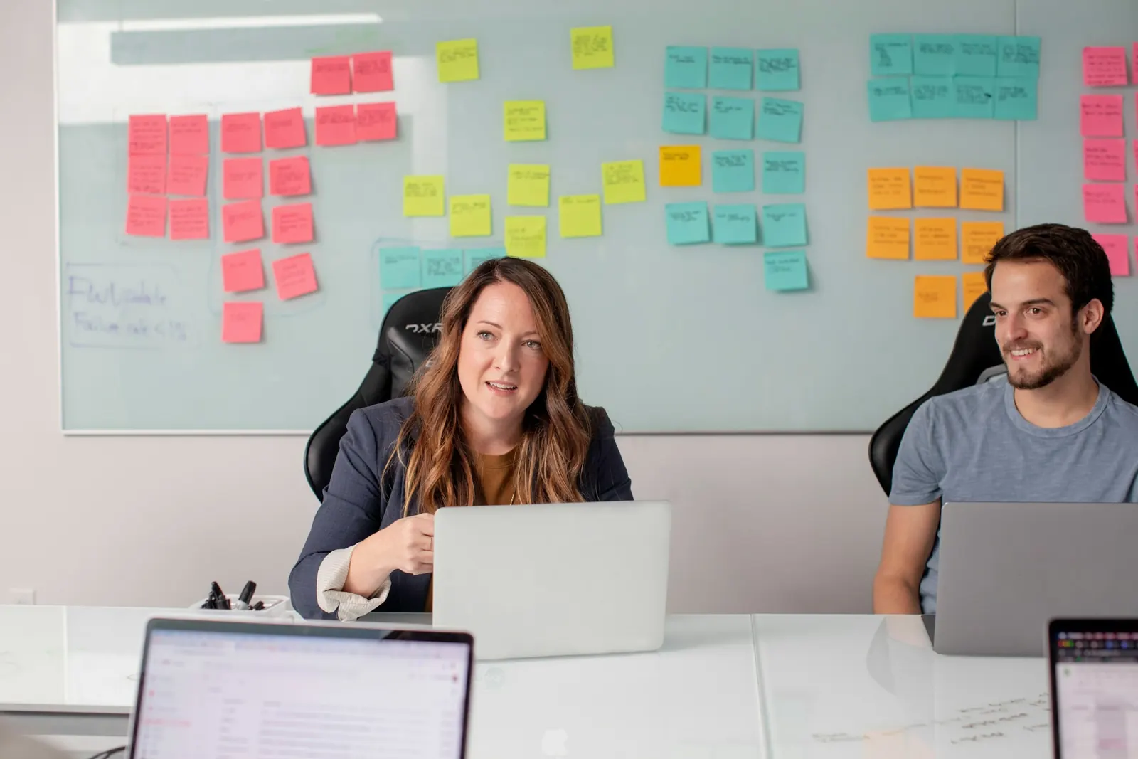 A team discussing processes in an AI workshop