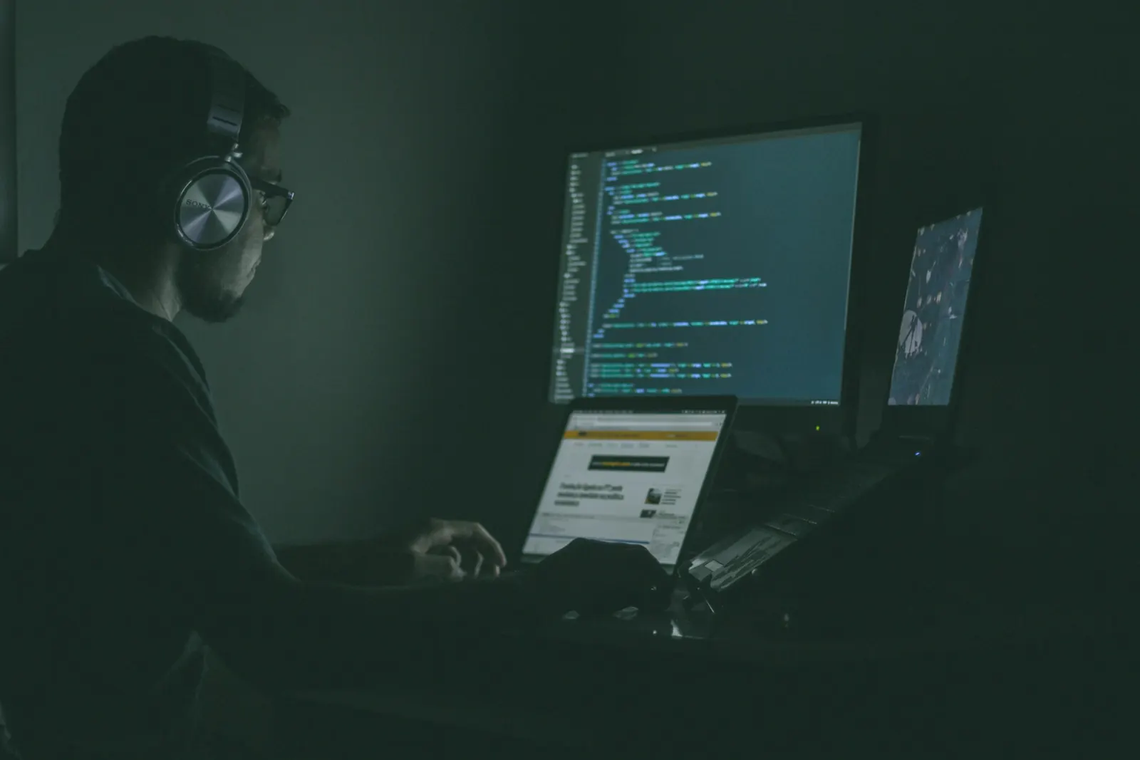 A specialist watching screens in a security operations centre